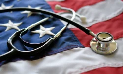Stethoscope resting on an American flag, representing the VA's role in recruiting rural healthcare providers