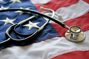 Stethoscope resting on an American flag, representing the VA's role in recruiting rural healthcare providers