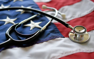 Stethoscope resting on an American flag, representing the VA's role in recruiting rural healthcare providers