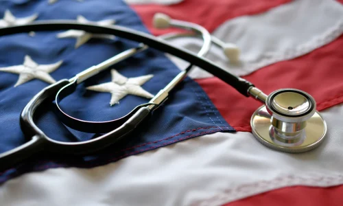 Stethoscope resting on an American flag, representing the VA's role in recruiting rural healthcare providers