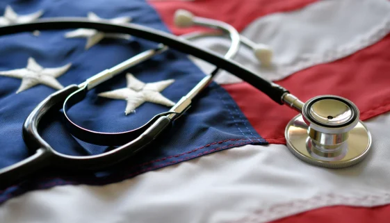 Stethoscope resting on an American flag, representing the VA's role in recruiting rural healthcare providers